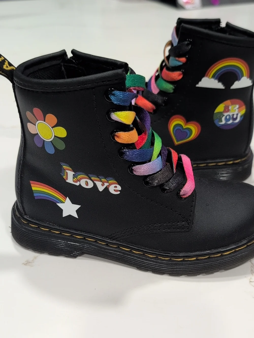 Dr. Martens Black Leather Boots with Multicolor Laces